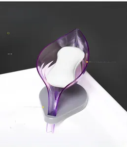 Purple leaf-shaped soap dish detail with drainage design and suction cup base