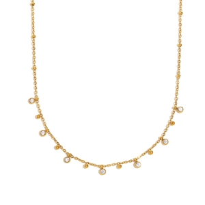 Chaîne à billes en acier inoxydable plaqué or 18K avec zircons sur fond blanc