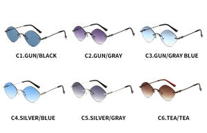 Detail view of rimless diamond-cut sunglasses with vintage carved metal temples and gradient lenses