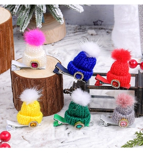 Detailed set of colorful knit mini hat hair clips with festive rhinestones and pom-poms