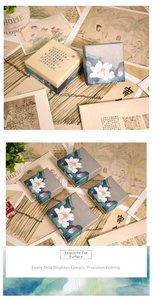 Detailed view of Chinese style paper jewelry box with vintage lotus print and calligraphy