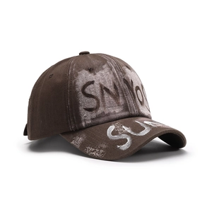 Vintage brown washed cotton baseball cap with distressed graffiti print for men and women