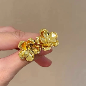 Minimalist golden metal flower stud earrings with three-layer 3D floral petals