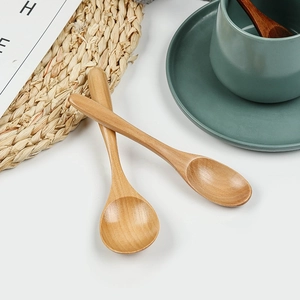 Japanese style wooden spoons for coffee and dessert on a natural minimalist setting