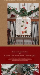 Close-up of Christmas table runner with red bell embroidery and white lace tassels