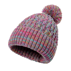 Close-up of a colorful knitted beanie with a large pompom and ribbed cuff detail