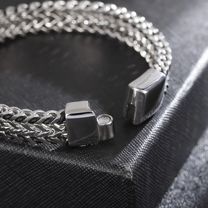 Close-up of the silver magnetic buckle on a double-row keel chain bracelet for men