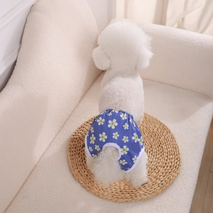 Cute dark blue floral print dog sanitary pantie with elastic waist on white plush sofa