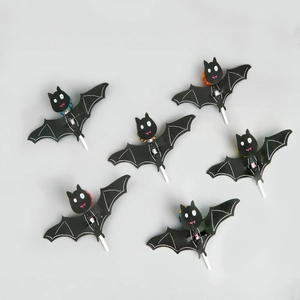 Set of six black bat-shaped lollipop holders for Halloween candy party decorations