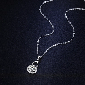 Sparkling pear-shaped silver necklace with a large round cubic zirconia center stone