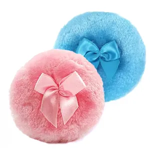 Soft plush baby powder puff with silk bow in pink and blue colors for body powder