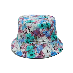 Close-up of vibrant floral print canvas fisherman hat with detailed fabric texture