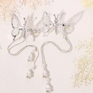 Silver butterfly tassel hair clips with faux pearls and bell charms for elegant styling