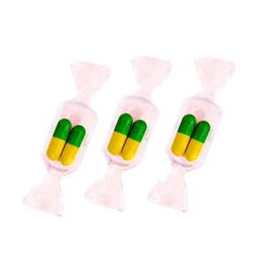 Cute candy-shaped clear storage box featuring yellow and green accessories inside