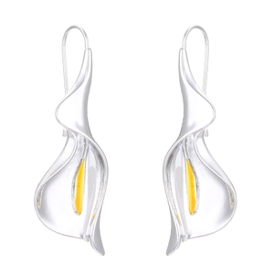 Elegant silver calla lily drop earrings with yellow stamen accents on a white background