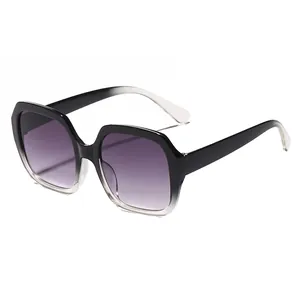 Oversized gradient black sunglasses with purple lenses for a stylish slimming face look