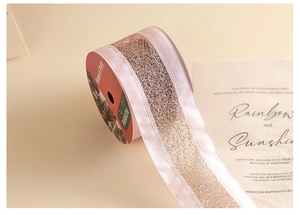 Detailed macro of pink and silver glitter mesh ribbon for elegant Christmas tree decoration