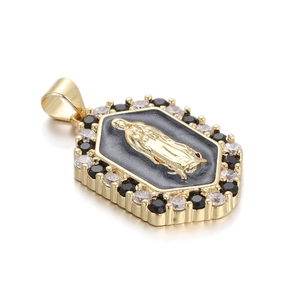 Golden hexagonal Virgin Mary pendant with black and clear zircons in a relief design