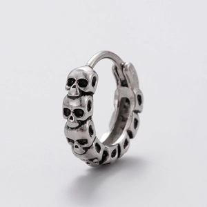 Vintage silver punk hoop earrings with continuous skull carvings for men in retro style