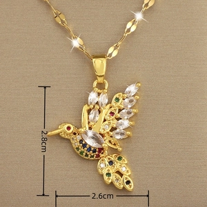 Macro view of colorful hummingbird pendant showing 2.8cm by 2.6cm dimensions
