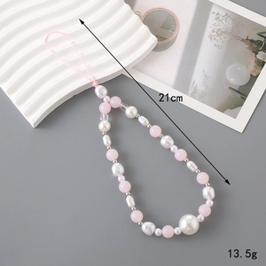 Pink and white beaded phone charm with bow design, 21cm length and 13.5g weight