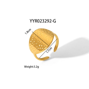 Minimalist gold adjustable stainless steel ring with textured round matte disc surface