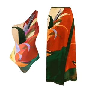 Chic one-shoulder tropical floral swimsuit set with matching long split beach skirt