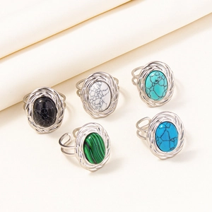 Detailed view of five boho adjustable 304 stainless steel rings with colorful gemstones
