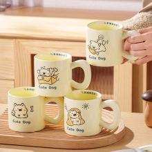 Detail of creative cream ceramic coffee mugs with cute dog patterns and chunky handles