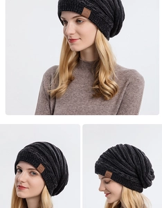 Multi-angle view of a dark grey knit beanie featuring a brown leather mountain patch