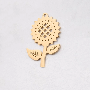 Close-up of golden stainless steel sunflower pendant with intricate hollow grid texture