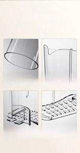 Detail of clear acrylic toothbrush holder with smooth edges and bottom drainage holes