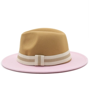 Detailed texture of two-tone wool fedora hat with camel crown and pink brim