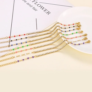 Adjustable gold stainless steel bracelets with colorful enamel beads and crystal accents