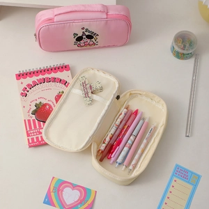 Detail of cute canvas pencil case with dog print and large storage compartments