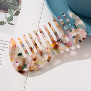 Chic marble texture acetate wide-tooth comb for daily hair styling in a lifestyle setting