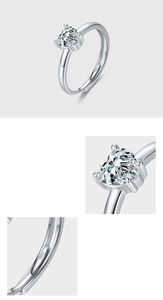 Detailed close-up of S925 sterling silver stamp and heart-shaped zircon prong setting