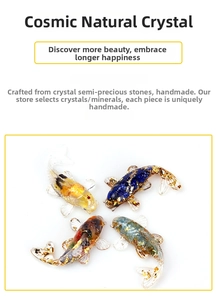 Set of four crystal koi fish figurines with gold foil in blue, yellow, and multi colors