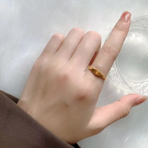 Minimalist 18K gold plated titanium steel ring with geometric rhombus design detail