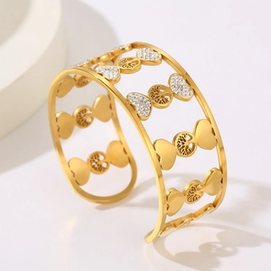 Gold-plated open bangle with Tree of Life and heart cut-outs featuring white crystals