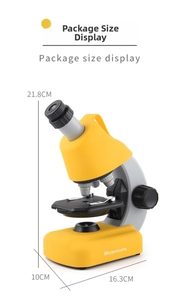 Detailed view of yellow and gray children's microscope with precise size dimensions