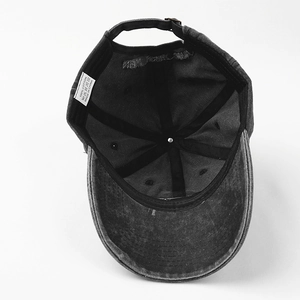 Internal view of washed cotton baseball cap with 100% cotton label and stitching detail