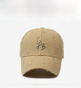 Front view of khaki distressed baseball cap with 3D letter B embroidery and frayed details