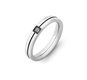 Detail of silver titanium ring with black enamel line and center diamond inlay