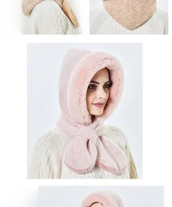 Detail of winter hooded scarf with thick plush lining and white polka dot patterns