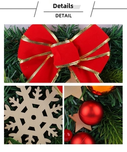 Detail of red velvet bow and laser-cut wooden snowflake on green pine branches