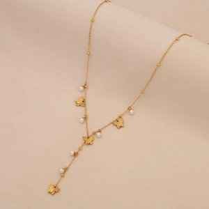 Gold Y-shaped necklace with delicate butterfly charms and elegant white pearls for women