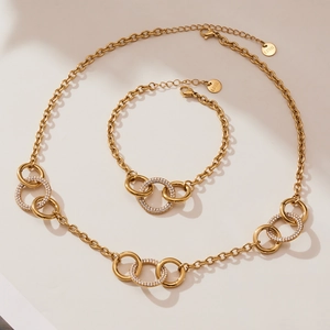 Parure de bijoux en acier inoxydable doré 18k avec collier et bracelet à triple anneau