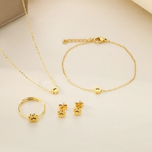 Polished gold stainless steel jewelry set featuring cute cat paw necklace and ring details
