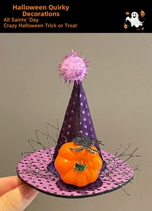 Detail of Halloween hair clip featuring a purple polka dot hat with pumpkin and spider